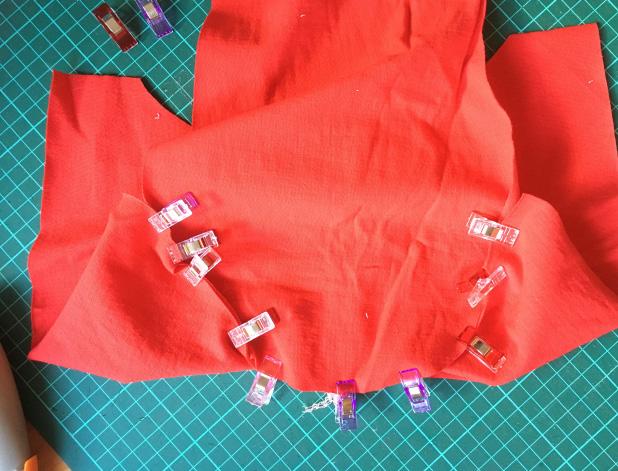 With right sides together, start with aligning the seams under the arm and pin.