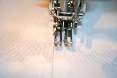 Sew a line 1/4" away from both sides of the drawn