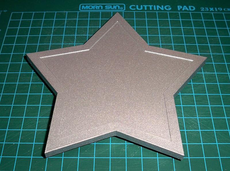 Place your outline/ridge from Step 2 in centre of the square and make sure the whole star is surrounded by foamboard. Glue it in place and leave overnight, again with a weight on top.