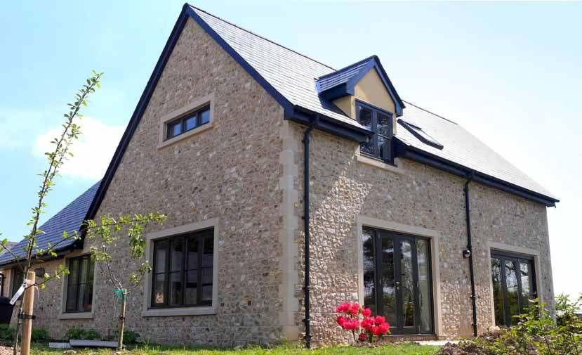 Windows Timber / Aluminium / Composite Timber Timber framed self-build with stained Oak windows and doors. All image rights retained by Potton.