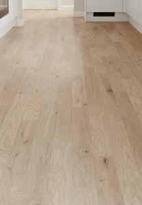 Howdens Professional With a textured finish, the elegant wood tones of this two strip laminate flooring can be used