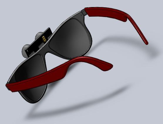 2.0 SYSTEM OVERVIEW As shown in 2.1, the assistive device aims to utilize three ultrasonic sensors mounted on sunglasses to alert the user of any obstacles at eye-level.