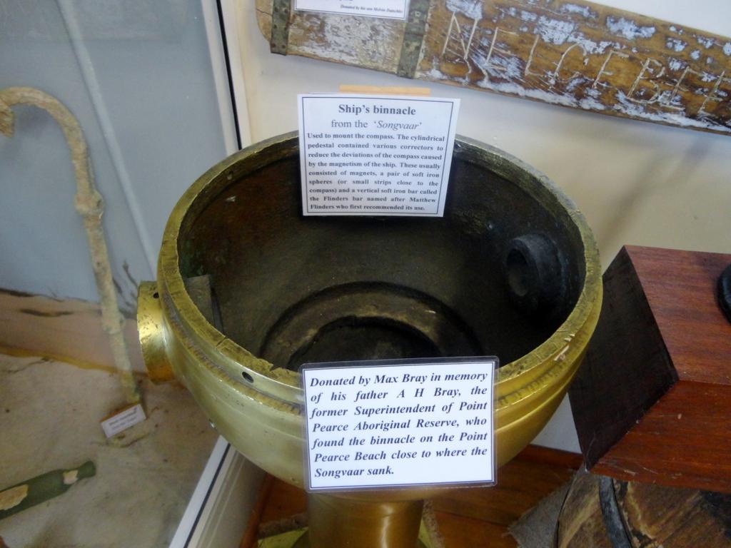 Figure 14: A ship's binnacle from Songvaar (1912) with attached labels describing the recovery of the item.