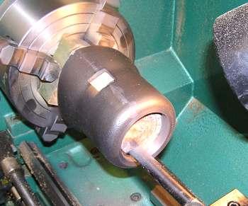 ) The dome was forced on the mandrel and then the inside of the top finished with a boring bar.