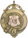 516* Handcrafted fob medal, in gold (9ct, 6.