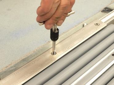 (NOTE: If using other systems be sure to adhere each layer to the bottom and top surfaces of the FP flashing sheets using