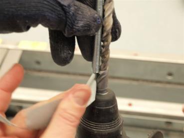 guide; mark the shank of the drill-bit for the correct anchor-hole depth.