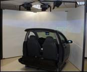 driving experience through the simulated environment to be a replication of authentic driving experience, as on a real site.