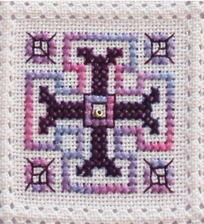 Once the cross stitch has been completed work round the pattern areas in back stitch using one strand of DMC 550.