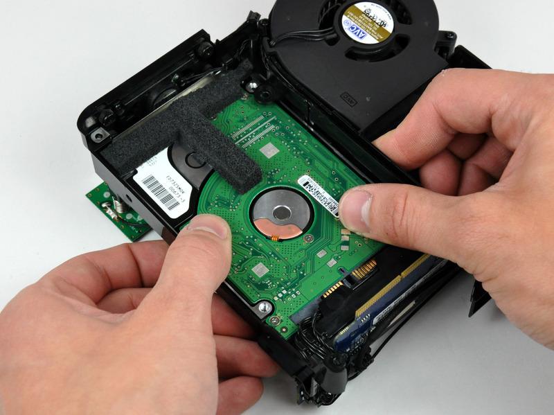 During reinstallation, it may be helpful to move the cables away from the SATA connector and to