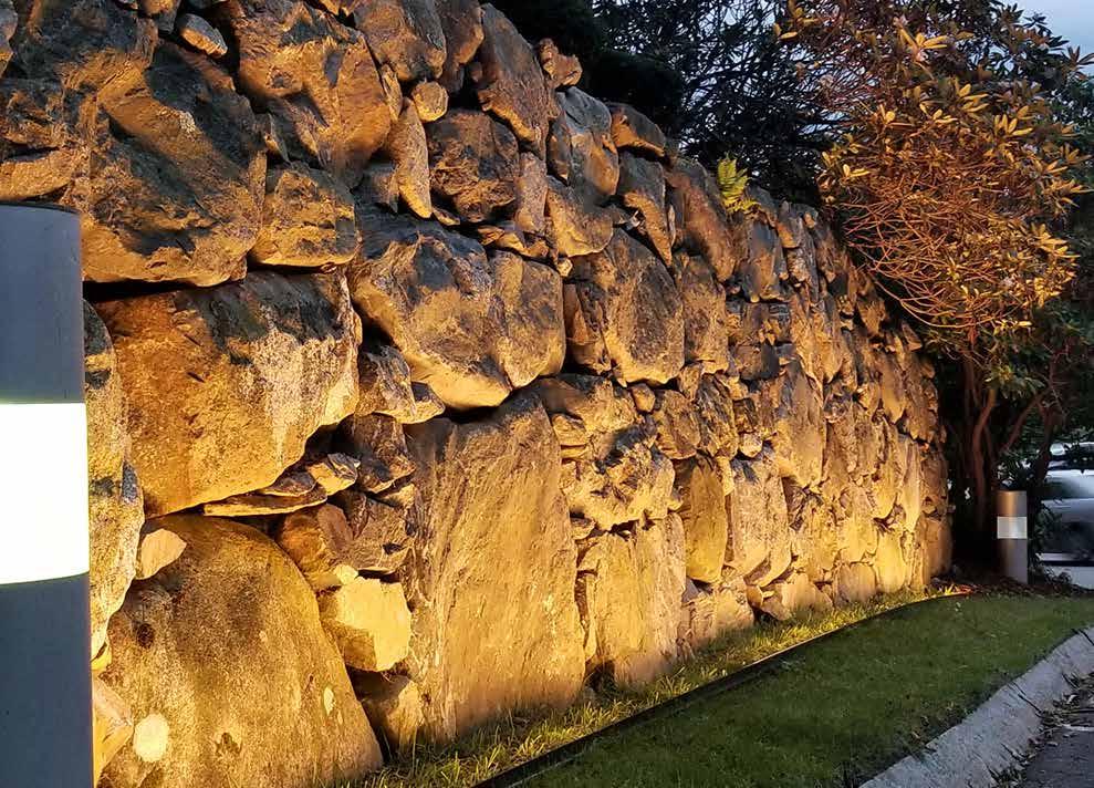 Example 4 Lighting an uneven stone wall This heavy set New England granite wall is beautifully enhanced with one 10 m (30 ft) strand of VAYA Free Form, set 6 inches from its natural unevenness. The 1.