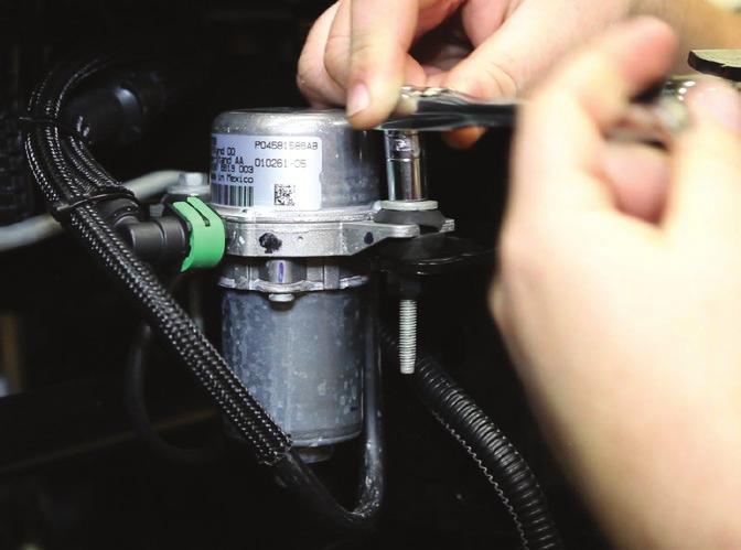 Ensure the tube is aligned properly and fully tighten the hardware with a 16mm socket.