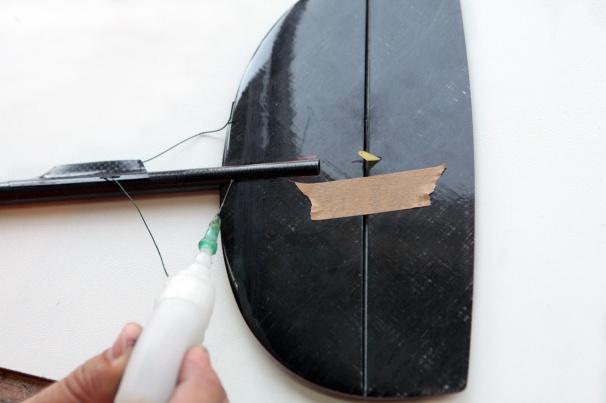 Glue the fin into the groove of the fuselage with superglue. (Fig.2.