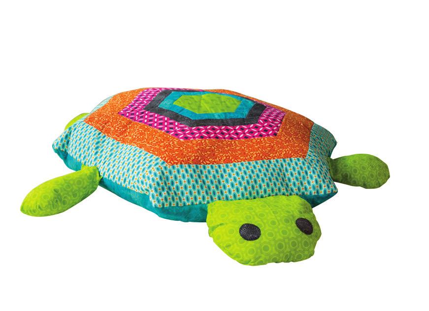 Cuddles the Hexi-Turtle Created by: Kelley McKenzie, Freelance Educational Coordinator Quilts are not the only thing that showcase hexagonal cuts!