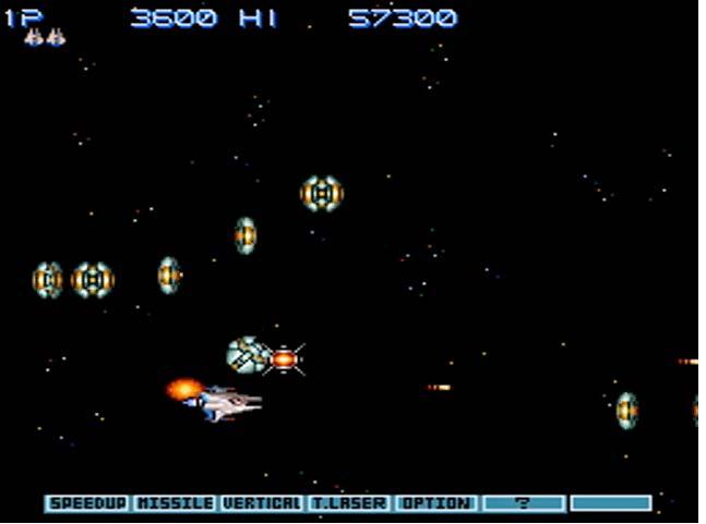 Gradius III Leading: Player narrowly avoids powerup trap, moves to engage line of