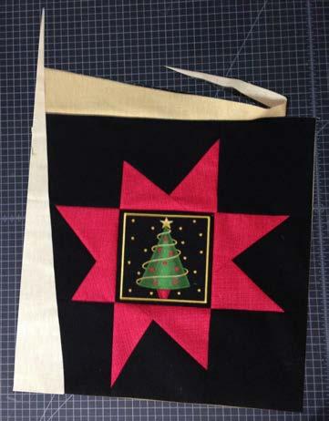 Merry Holiday Twinkling Stars Wallhanging Instructions Working in a counter-clockwise direction, add a second triangle to the block, matching 90-degree corners.