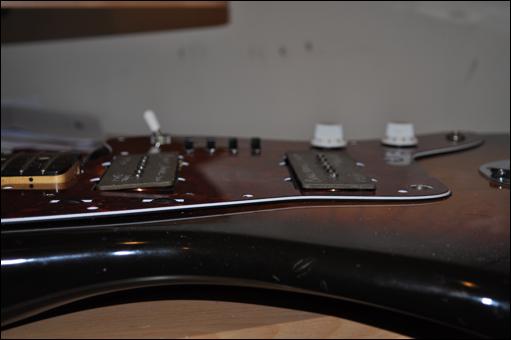Step 5 Fit the pickups & set the height Simply drop the pickups in place, then keep adding more foam strips so the