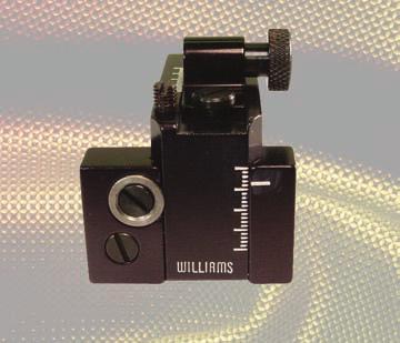 Wherever possible, the manufacturers mounting screw holes in the receivers of the guns have been utilized for easy installation. The upper staff of the Williams 5D sight is readily detachable.