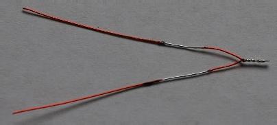 Cut 4 inches (10 cm) of red 26 GA magnet wire and fold the wire in half.