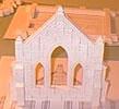 11. Make the pillars by gluing two halves of the smooth window trim together. The finished window side of the church should look like this.