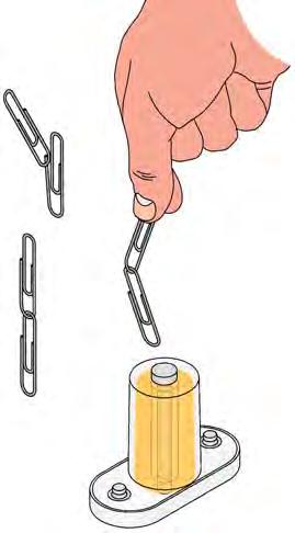 The paper clip gets sucked into the center of the electromagnet and stays suspended there until you release the switch.