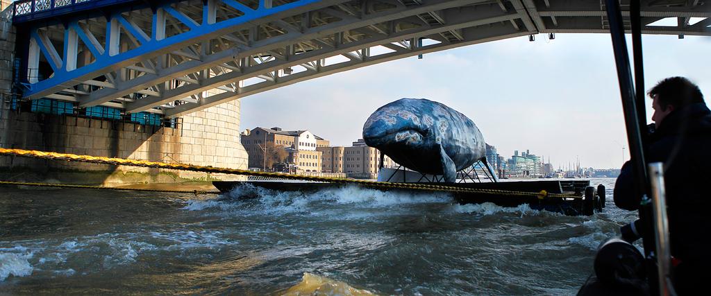 Artificial whale on the Thames River, London.