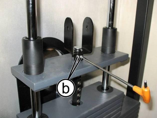 in the figure at the side. Figure 6.6-1 2. Remove the pulleys mounted on the cross. 3.