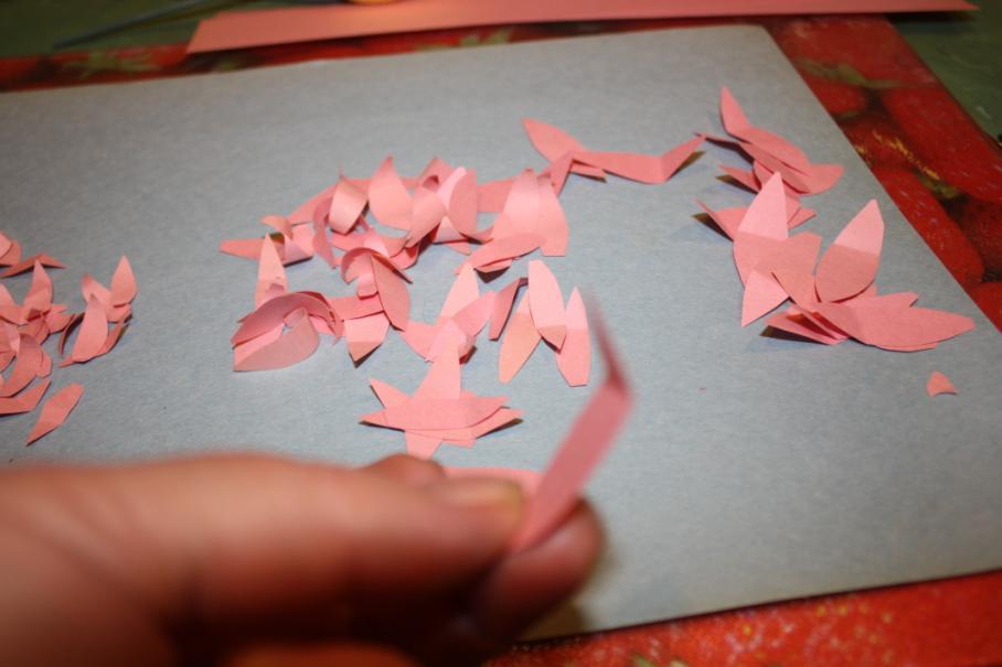 3. Take each petal and fold it about 1/3d of the distance from the