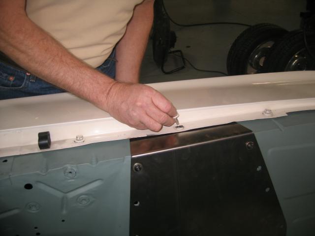 To install the inner fender panels loosen the center fender bolts and remove the one over the