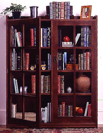Bookcase Traditional glass-pane and wood-muntin doors highlight this free-standing piece. As the saying goes, there's nothing like good books.