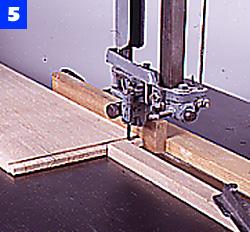 Use a router and straightedge guide to cut the mortises in the case sides for the bottom rail. Again, square the mortise cuts with a sharp chisel.