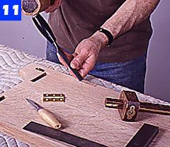 Remove most of the waste from each mortise by boring overlapping holes using a drill press with a 3/8-in.-dia. bit. Use a sharp chisel to square the ends and walls of each mortise.