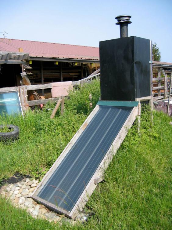 Figure 2: Example of modified, reused mechanical technology. Refrigerator converted to a passive solar food drier.
