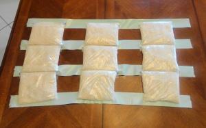 Step 5: Affix the bottom of the bags to the next strip of tape.
