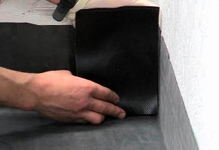 Apply Fix-R EPDM Primer to the front & back of the flap and to the membrane on
