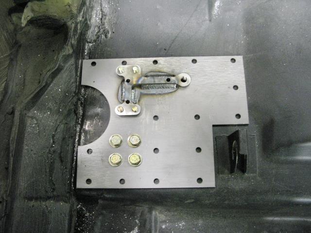 Do not torque the bolts at this time. Figure 11 Install the Spring Pocket and Floor Pan Doubler 21.