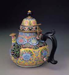 Fig.21 Enamelled tea pot with floral design on