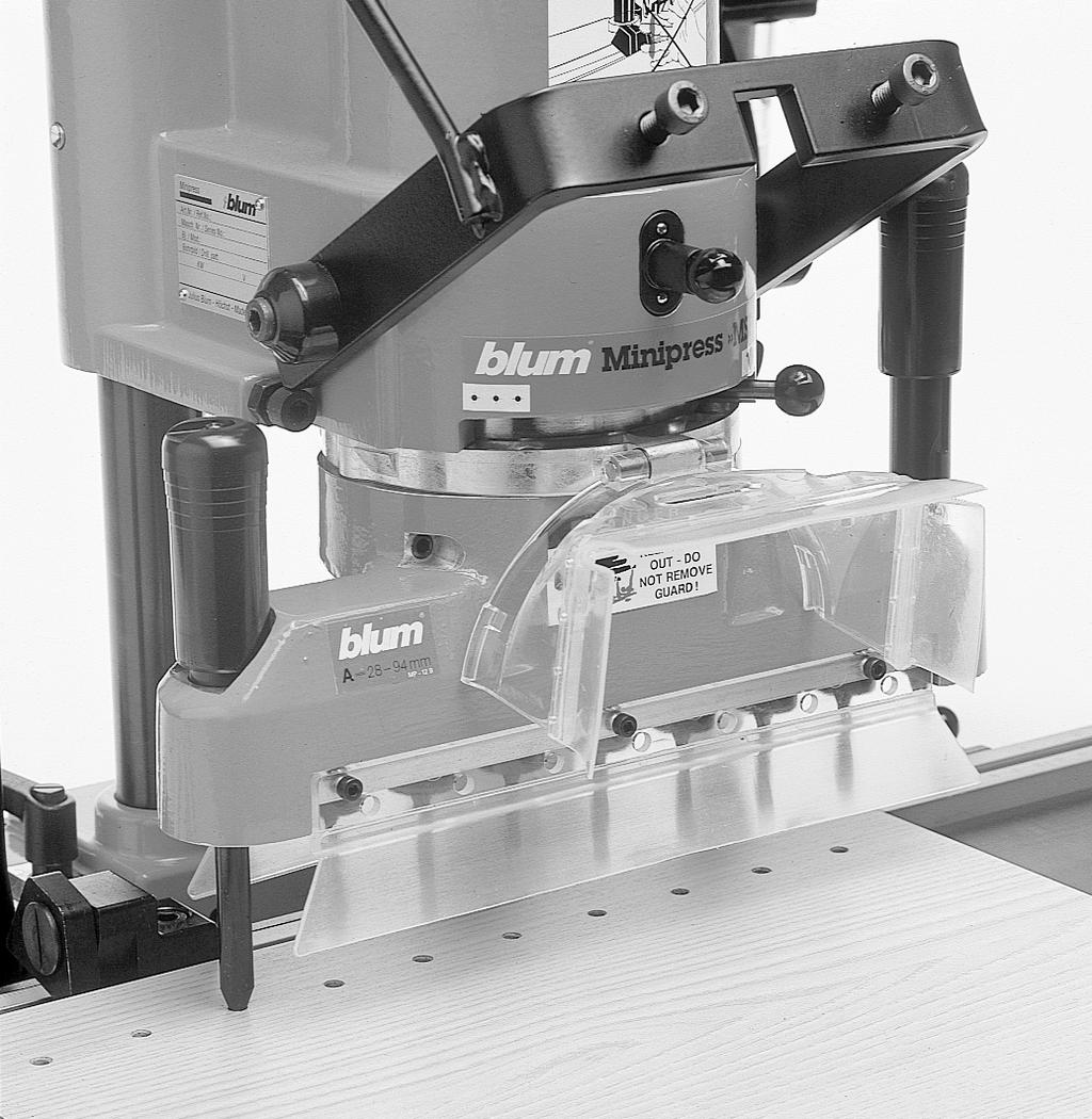 D3 L Both boring heads include: - Setup jig - Distance spacer for MINIPRESS stroke depth 8-spindle boring head features: - Drills (8) holes, spaced mm apart,