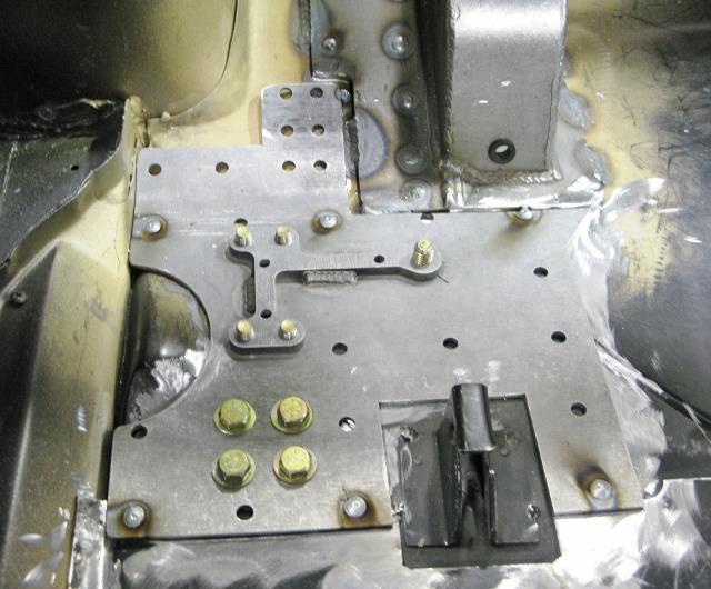 Tack weld the doubler plate to the floor pan (Figure 11). Figure 11 Tack Weld Doubler Plate 27.