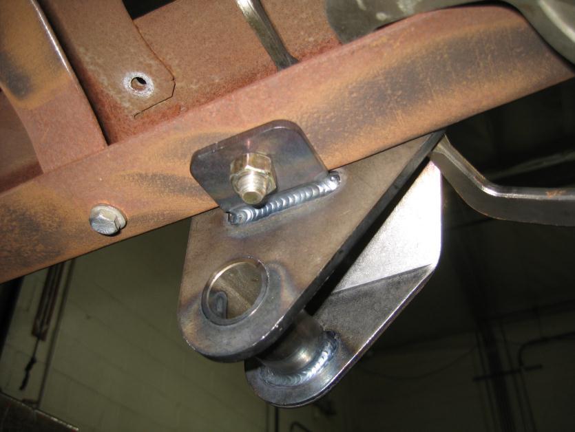 On 1953-1956 pick ups draw a line through the front original shackle hanger hole.