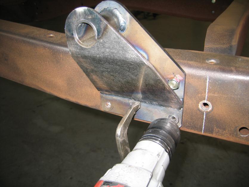 9. 1953-1956 Ford pick up only Bolt the bracket upside down on the frame rail as pictured and use the same drilling procedure as before.