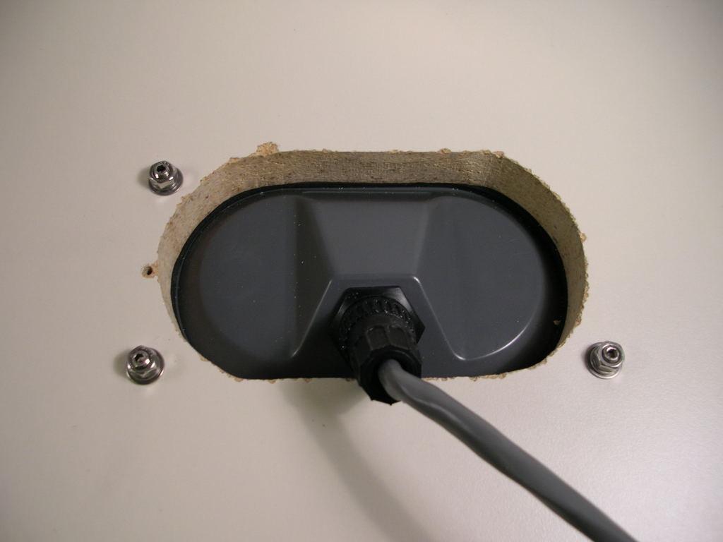 To do so, you must align the plug on the end of the cable with the receptacle, push it on, and then turn the outer ring on the plug clockwise until it locks into place with a slight snap.