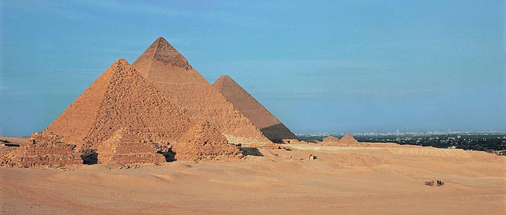 The Great Pyramids; Mycerinus, Chefren, and Cheops. c. 2650 2500 B.C.E GiganDc mountain- like structures built as burial vaults for pharaohs.