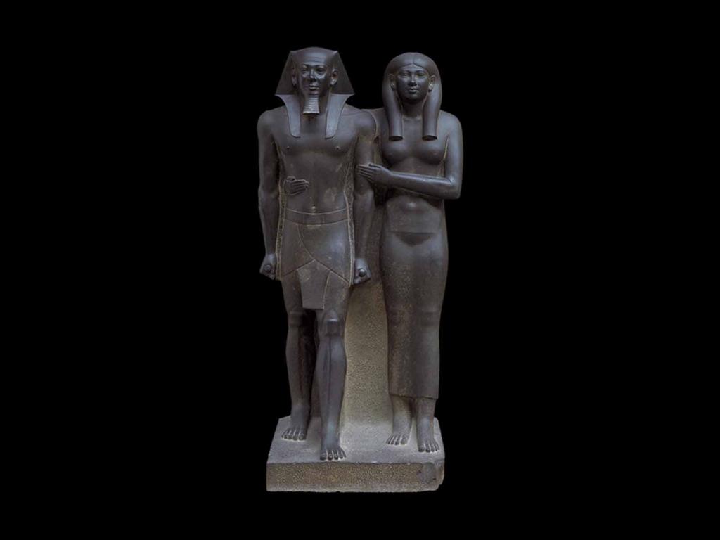 EgypDan Sculpture: Characterized by compact, solidly structured figures that embody qualides of strength and geometric clarity which is also in EgypDan architecture.