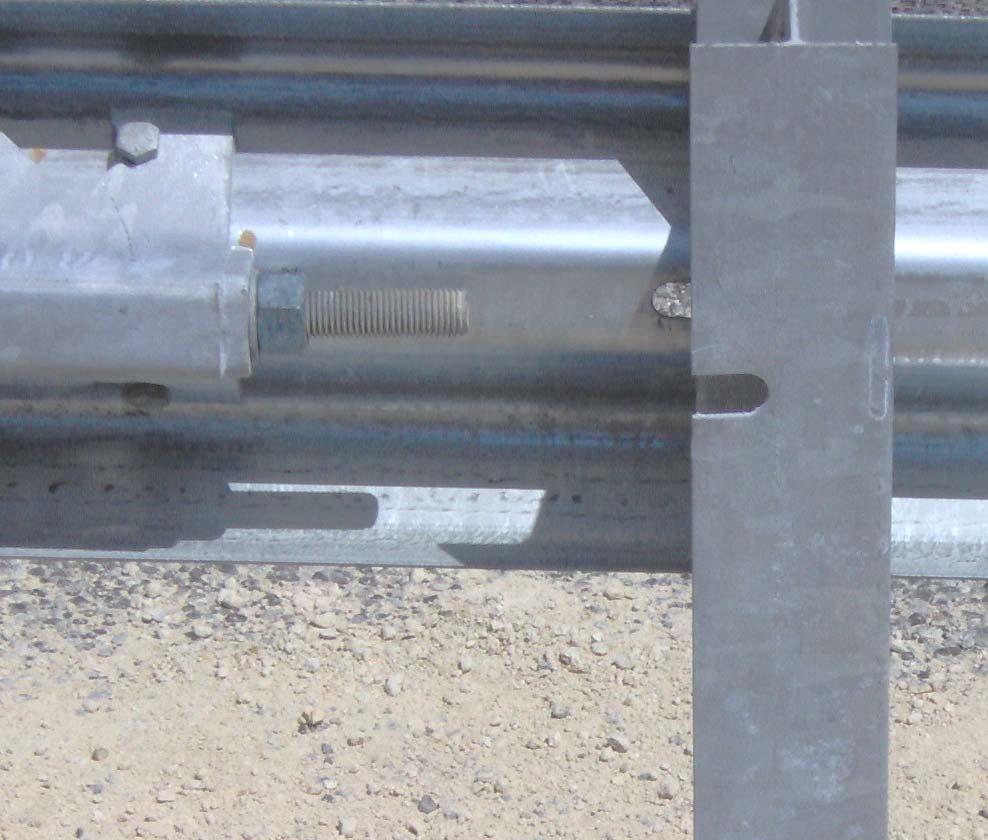 There is an open-ended slot in the flange of the post at the post bolt connection. Be sure upper post #2 is installed with this slot facing post #1.