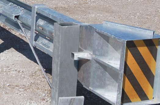 Place the impact head with the feeder guide chute over the end of the W-beam guardrail.