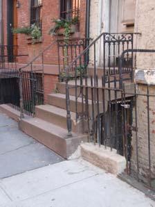 Stoop Railings: Full or partial bands of scrolls, round