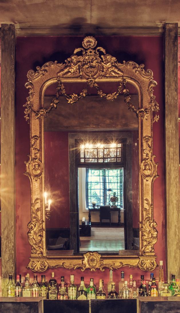 GILDED MIRROR, NAPOLEON II A gilded mirror purchased in a Parisian antique market and shipped to Colombo for