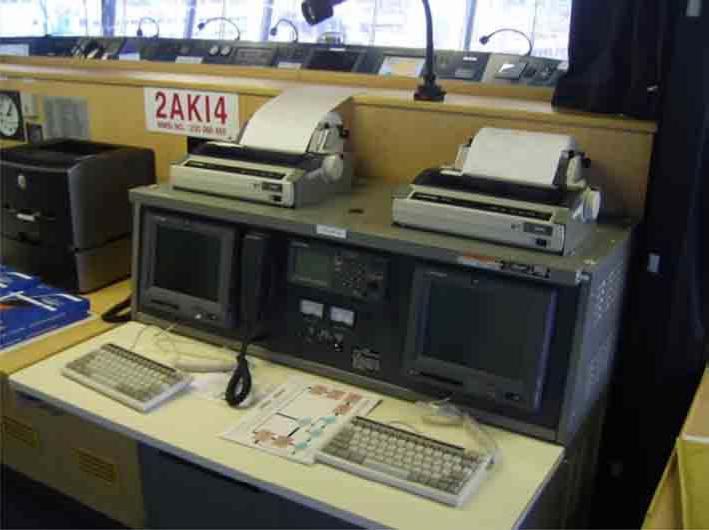 Maritime Manual 39 FIGURE 24 Inmarsat C fitted on the bridge of a large ship with data terminals and printers.