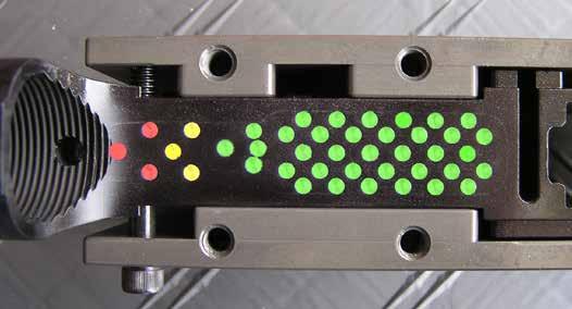 Remove the drilling adapter plate from the jig to make it easier to drill the holes to their proper depth. Refer to color- coded Fig. 3 for hole depth reference.